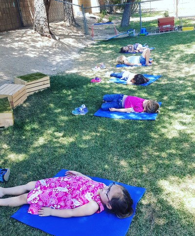 Yoga outside with children